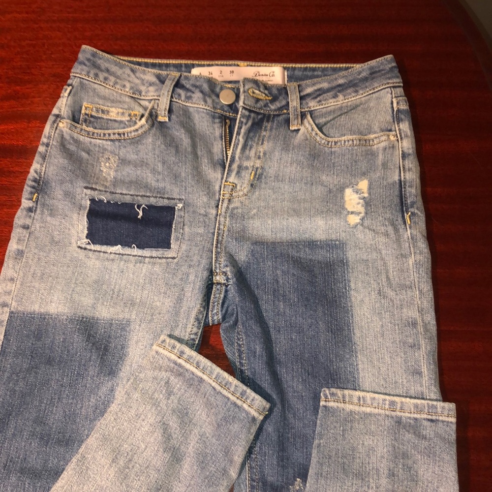 Distressed patch wash jeans